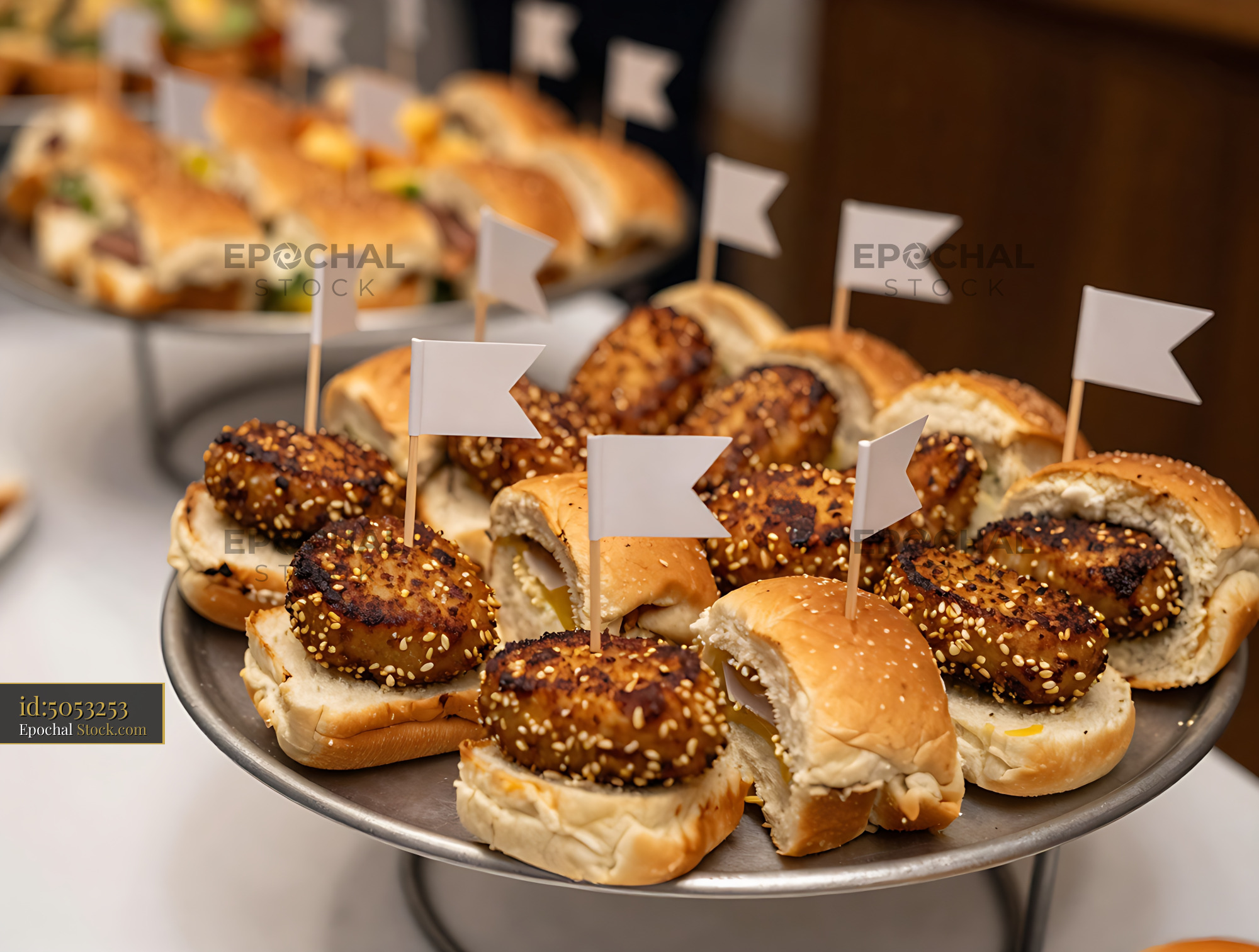 Goetta Sliders with Sesame Seed Buns and Flag Picks at Gourmet Event - stock photo