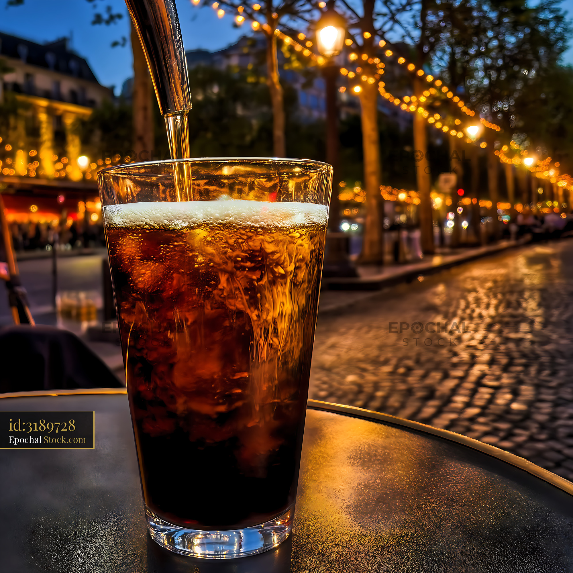 Nitro Caramel Coffee Poured at Evening Cafe - stock photo