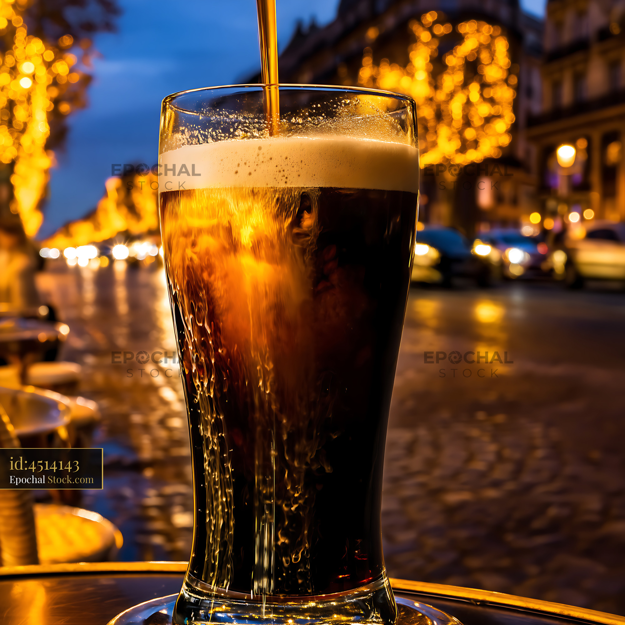 Nitro Caramel Coffee Pouring Into Glass at Night - stock photo