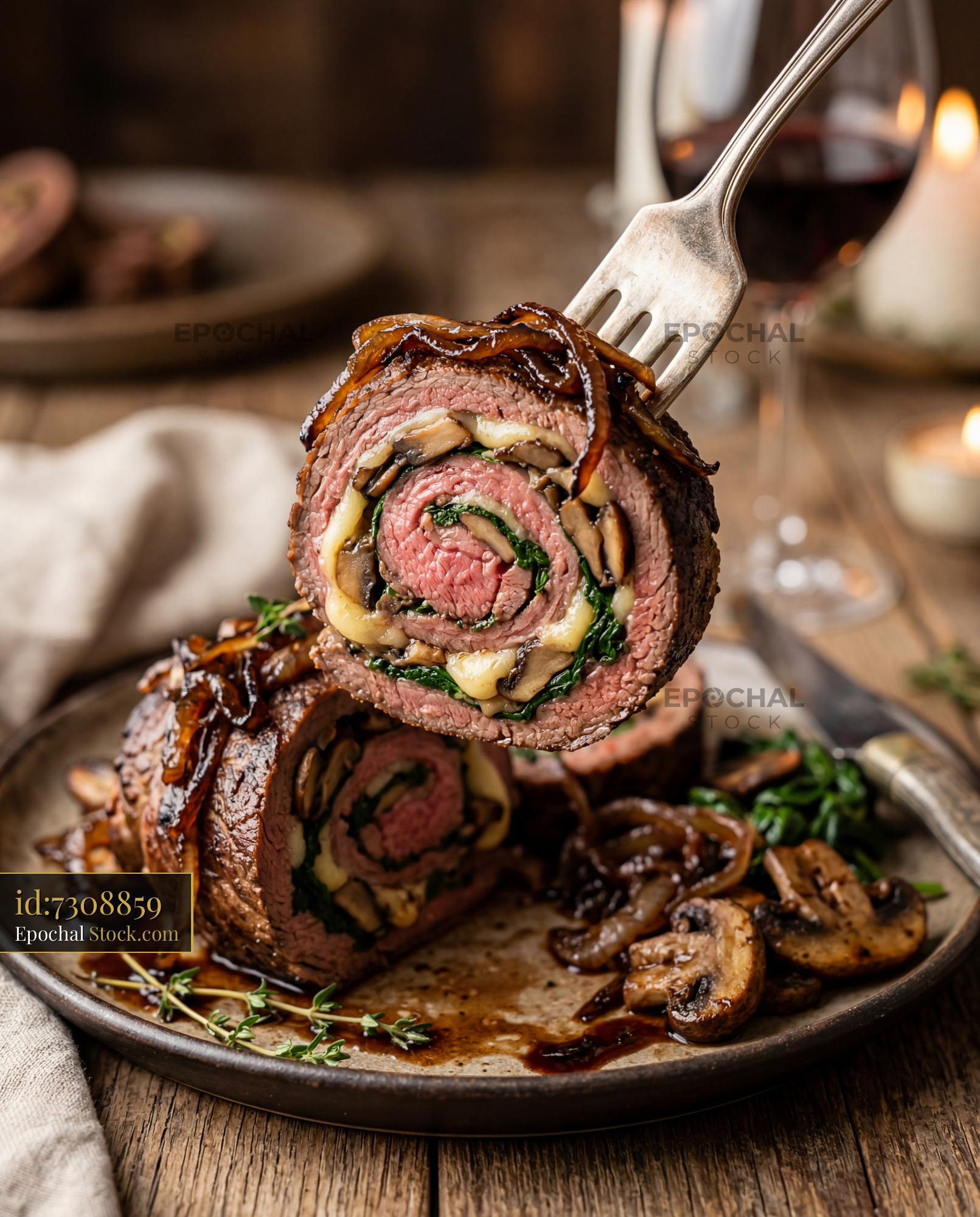 Beef Roulade Slice Lifted on Fork, Fine Dining - stock photo