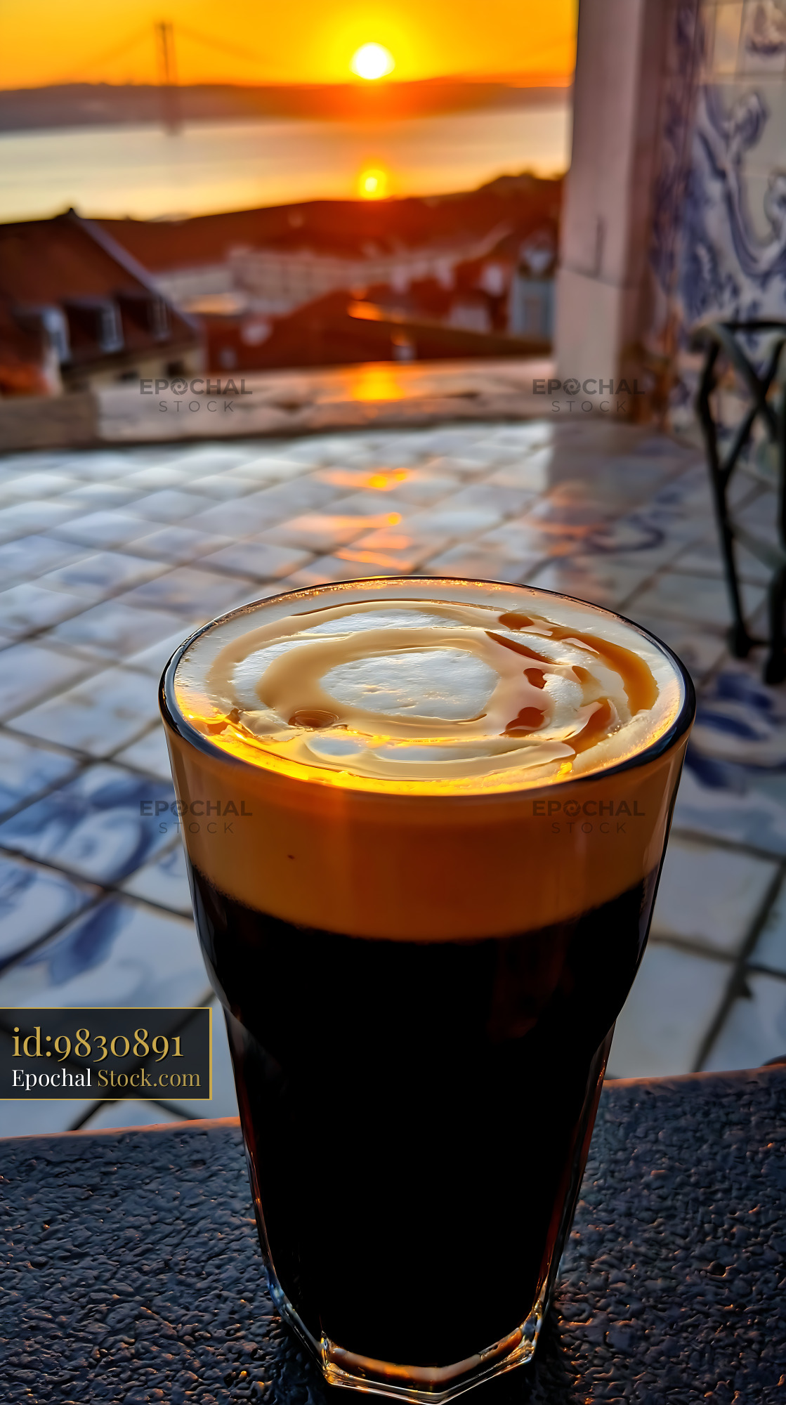 Nitro Caramel Coffee Overlooking Sunset Bay - stock photo