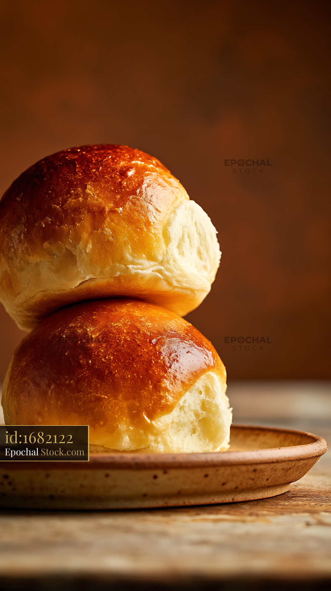 Fresh Golden Bread Rolls on Wooden Plate - stock photo