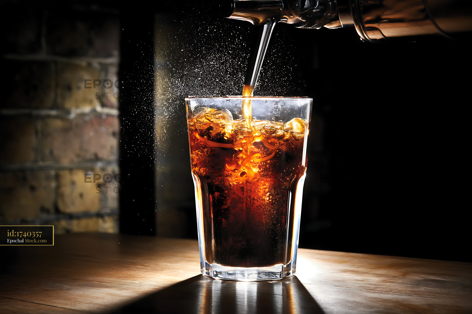 Nitro Caramel Coffee Pouring from Tap with Ice - stock photo