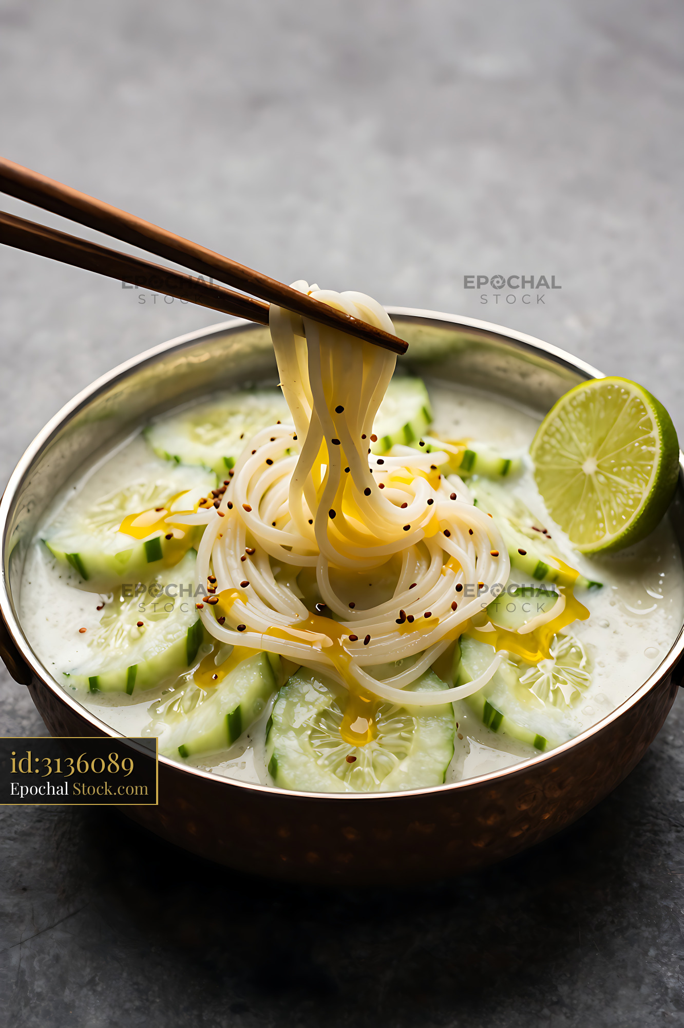 Kakdi Koshimbir Noodle Soup with Cucumber Garnish - stock photo
