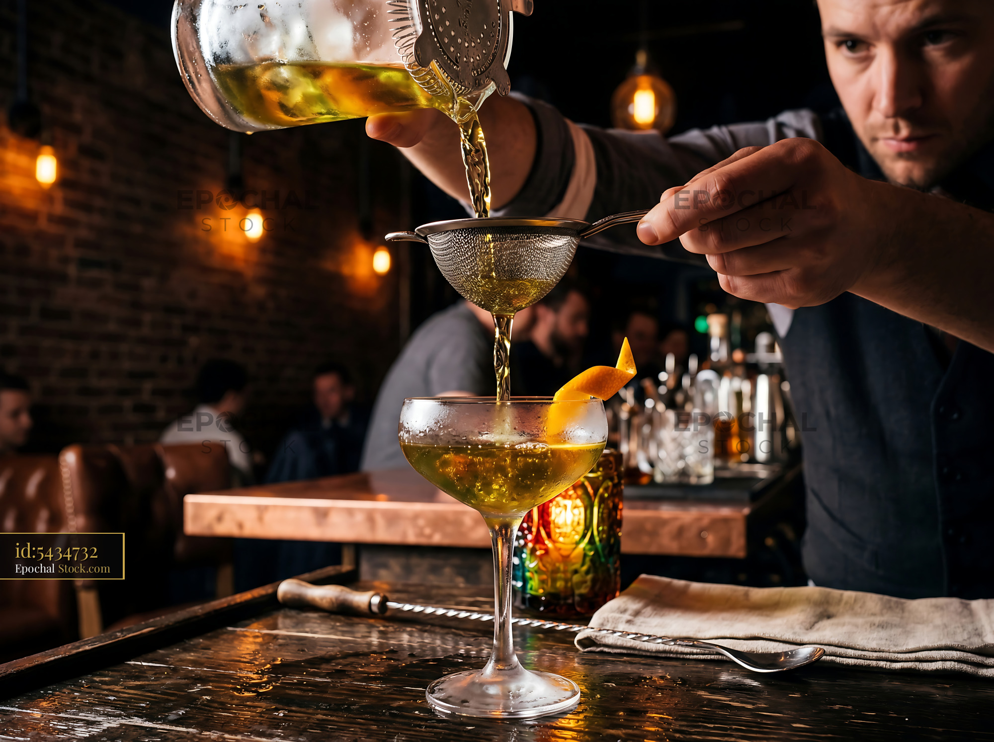 Tipperary Cocktail Poured Through Strainer - stock photo