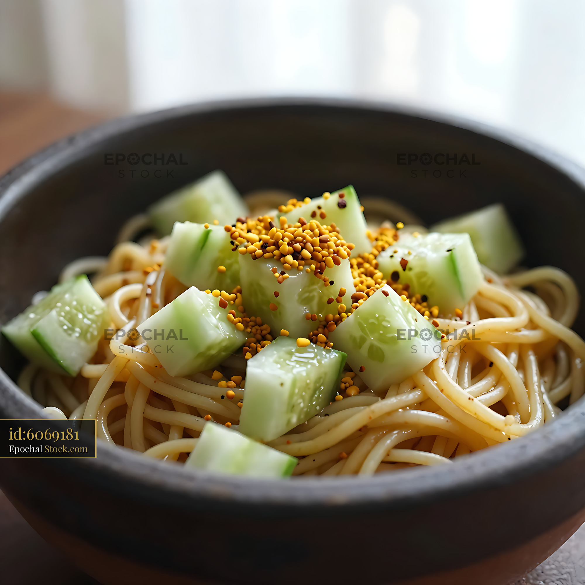 Kakdi Koshimbir Noodles in Black Bowl - stock photo