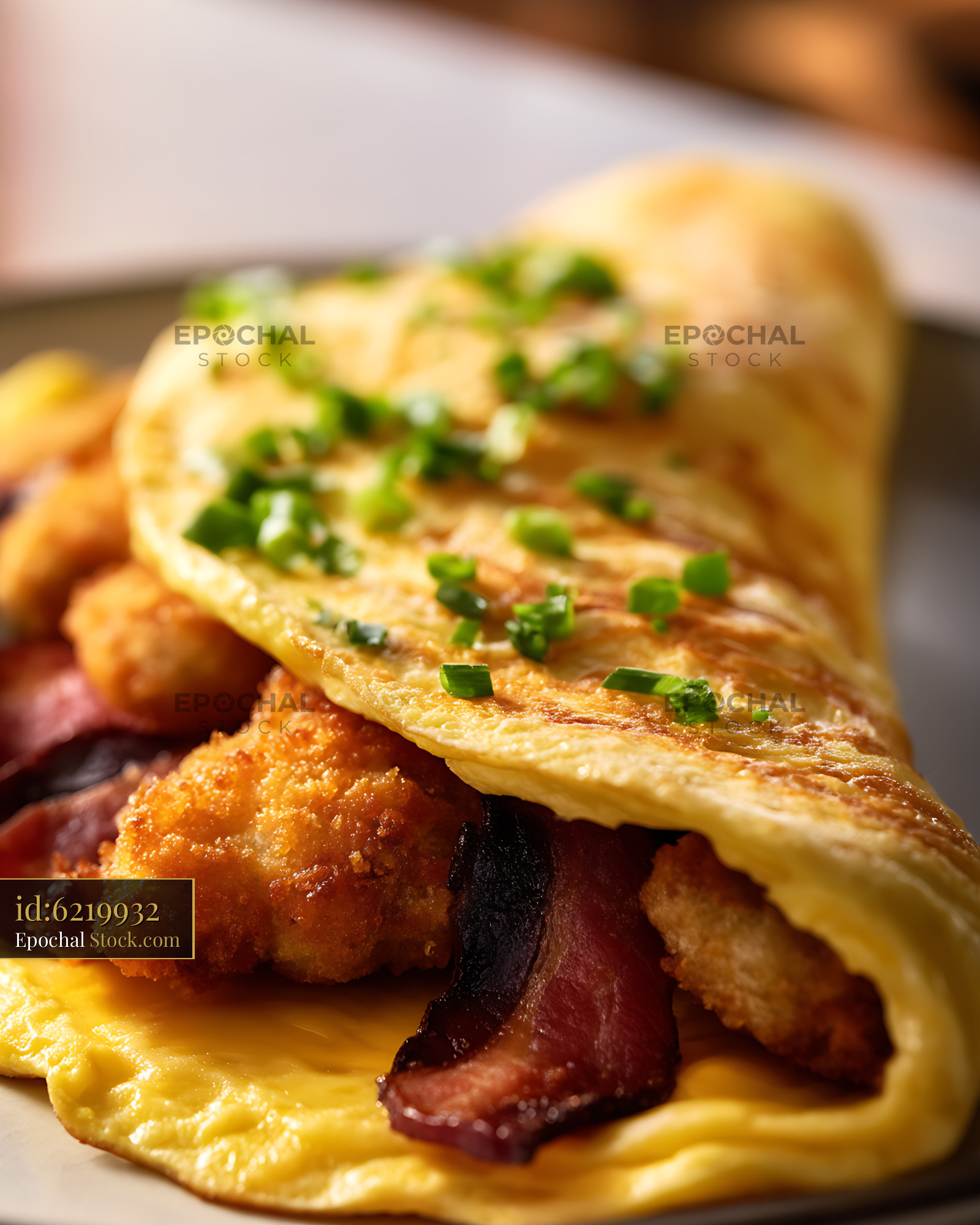 Crispy Chicken Omelet Sandwich with Bacon - stock photo