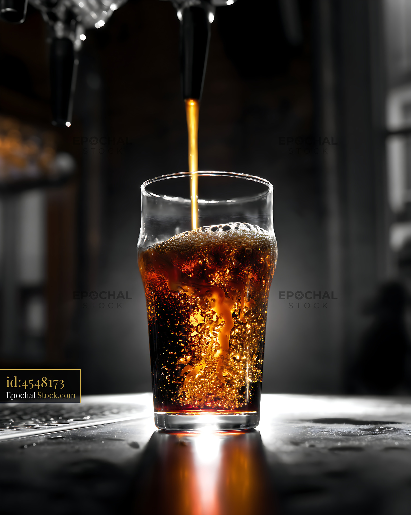 Nitro Caramel Coffee Pouring into Iced Glass - stock photo