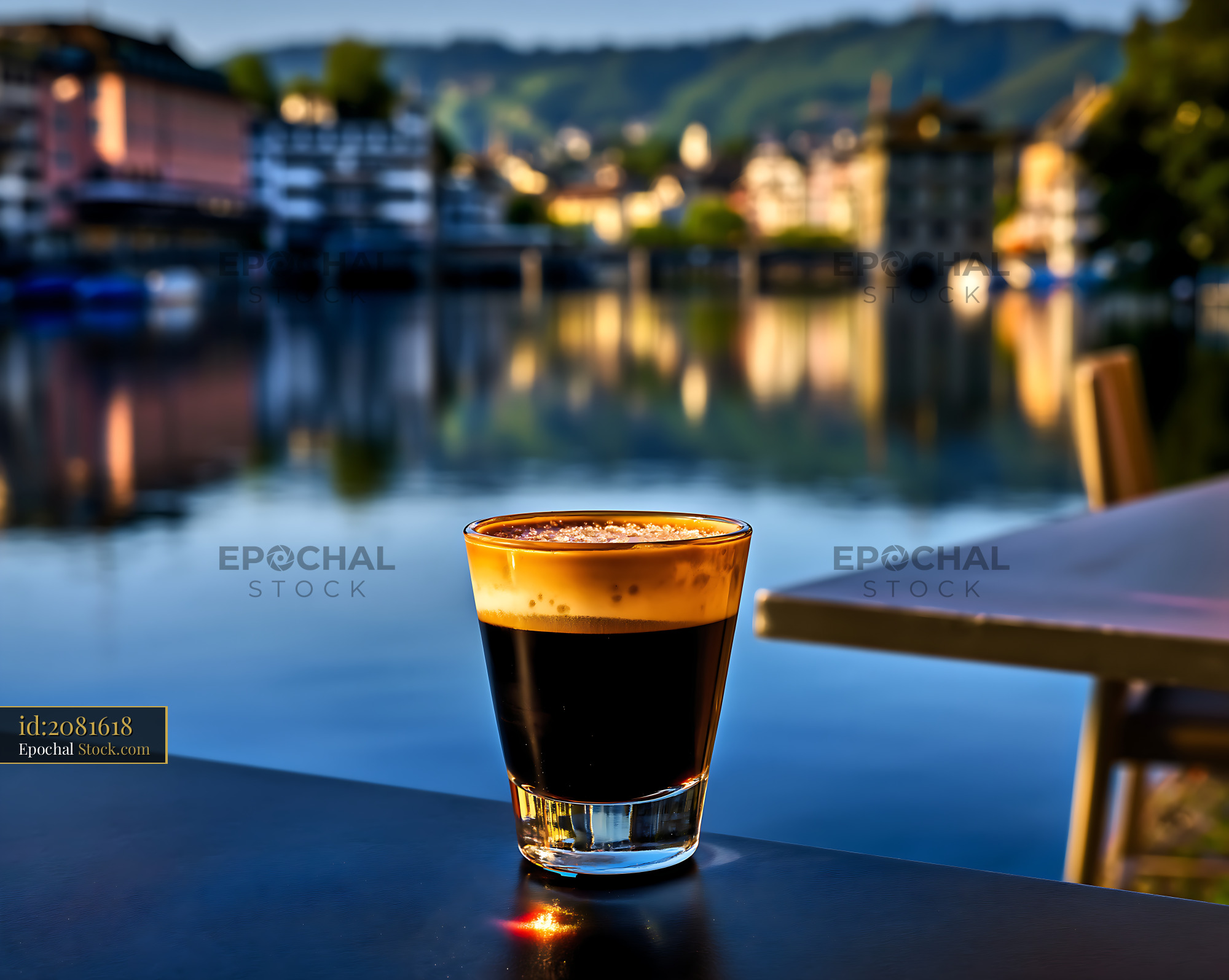 Nitro Caramel Coffee Overlooking River Town - stock photo