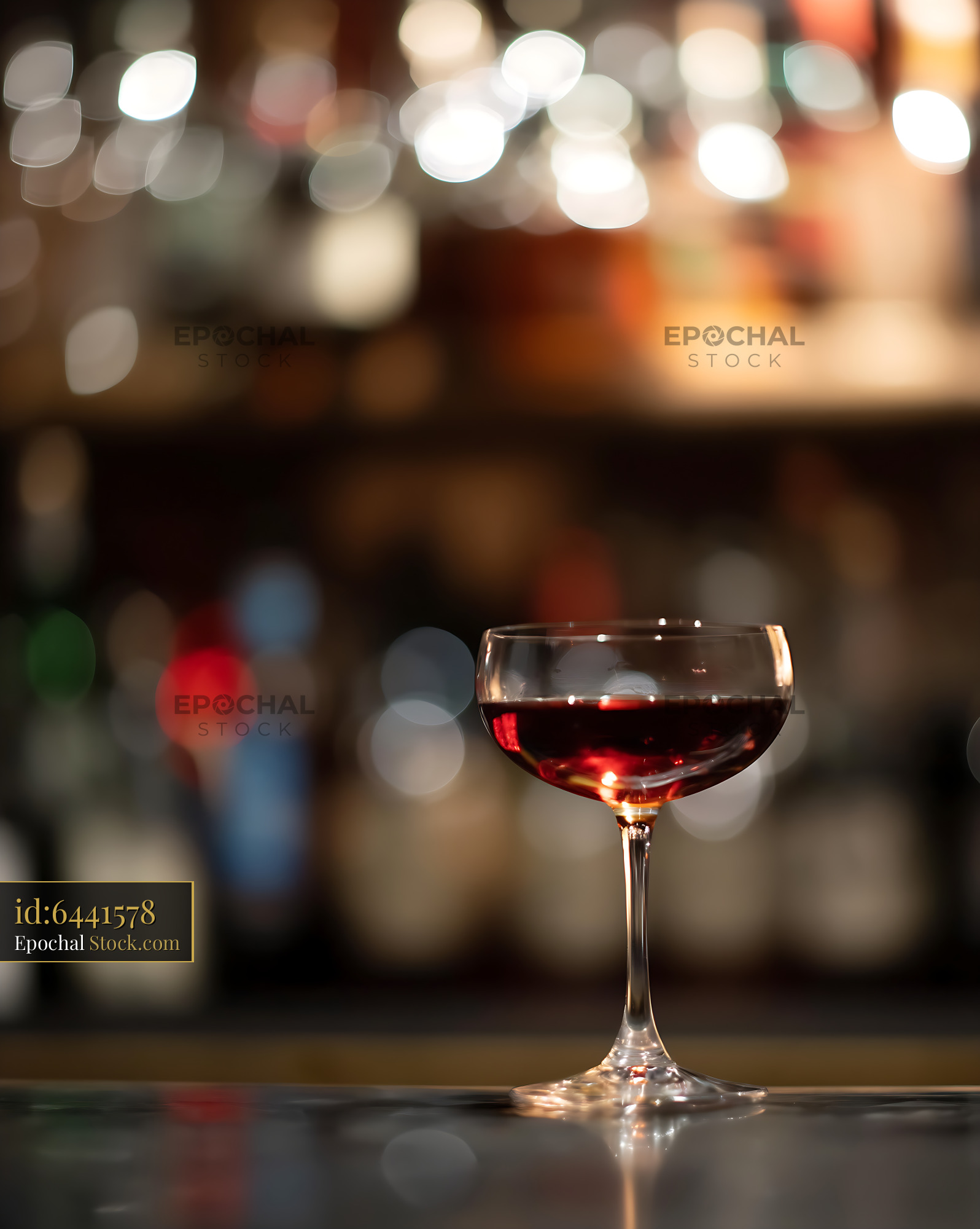 Bushwick Cocktail in Coupe Glass at Bar Counter - stock photo