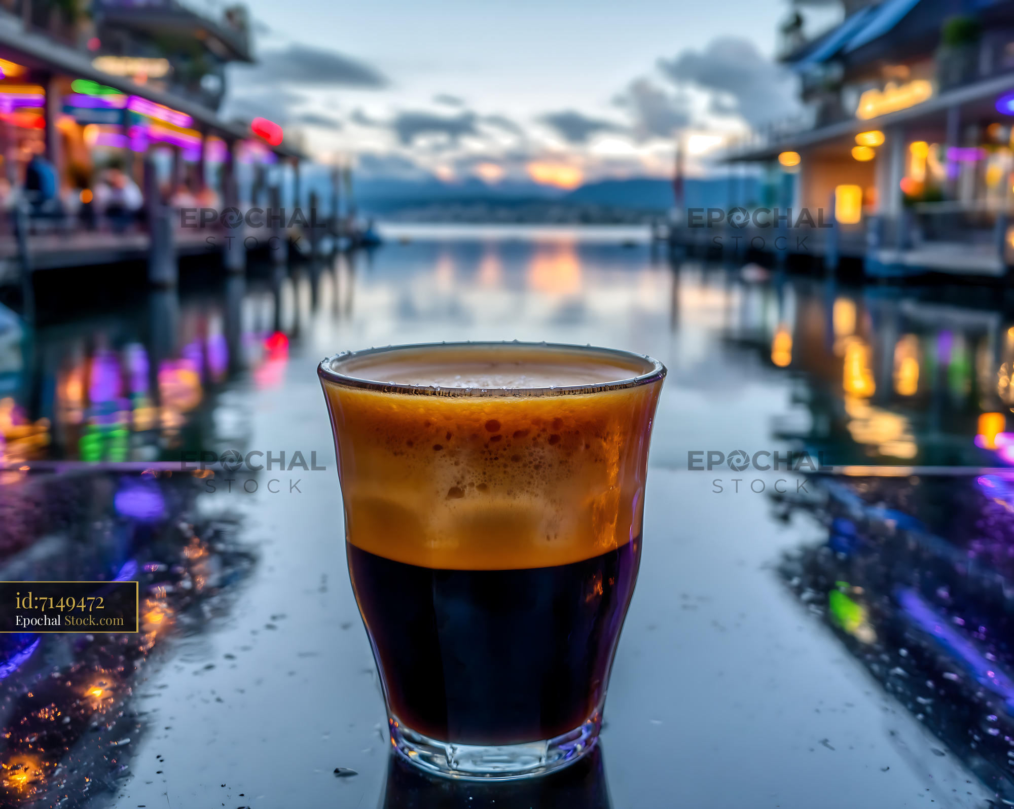 Nitro Caramel Coffee by Evening Waterfront - stock photo