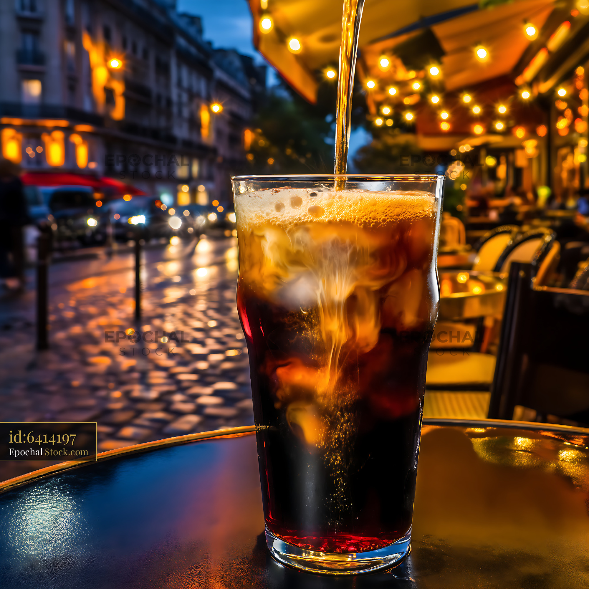 Nitro Caramel Coffee Poured Over Ice at Dusk - stock photo