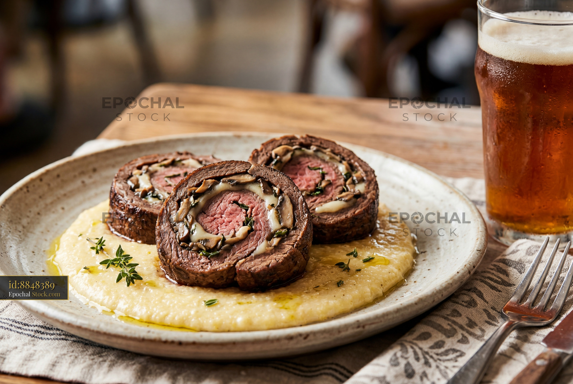 Beef Roulade with Polenta and Fresh Herbs - stock photo