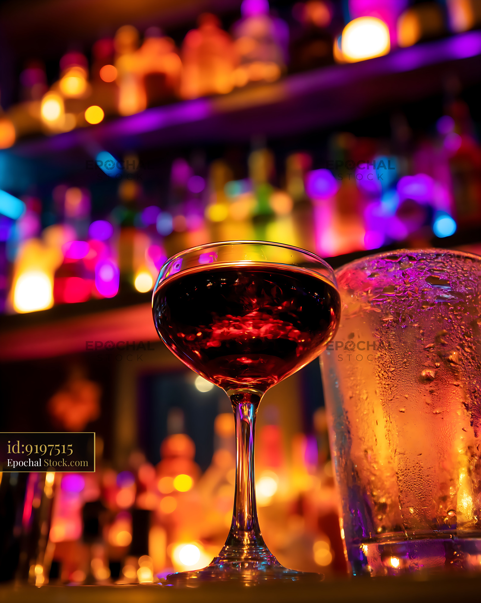 Dark Red Bushwick Cocktail at Vibrant Nightlife Bar - stock photo