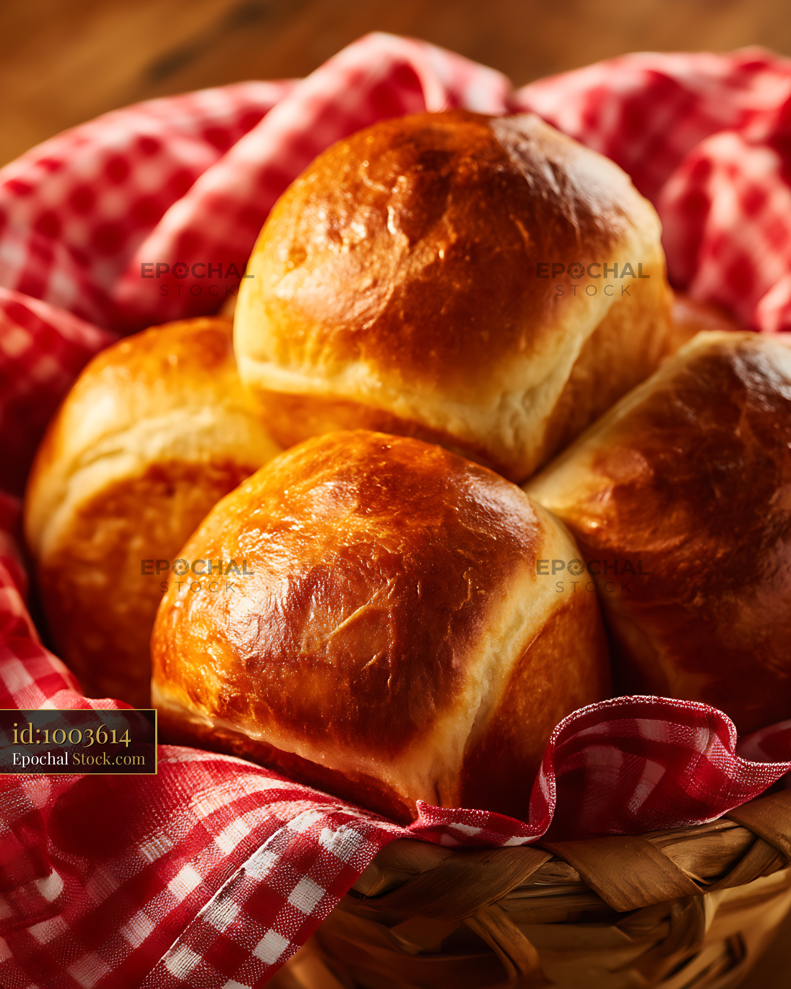 Golden Dinner Rolls on Checkered Cloth - stock photo