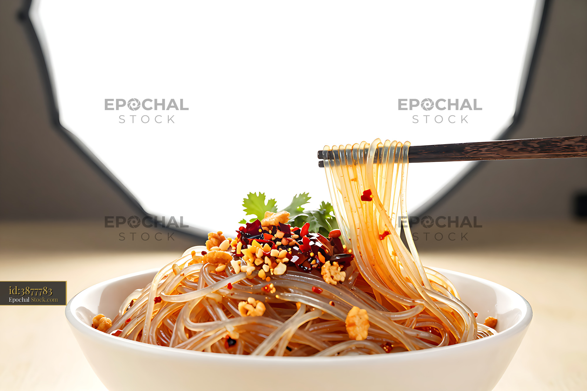 Sichuan Glass Noodle Salad Twirled on Chopsticks - stock photo
