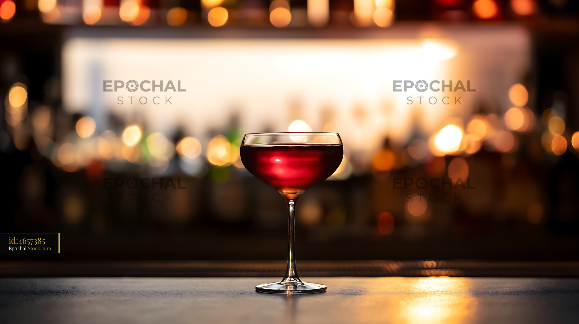 Bushwick Cocktail in Coupe Glass at Bar - stock photo