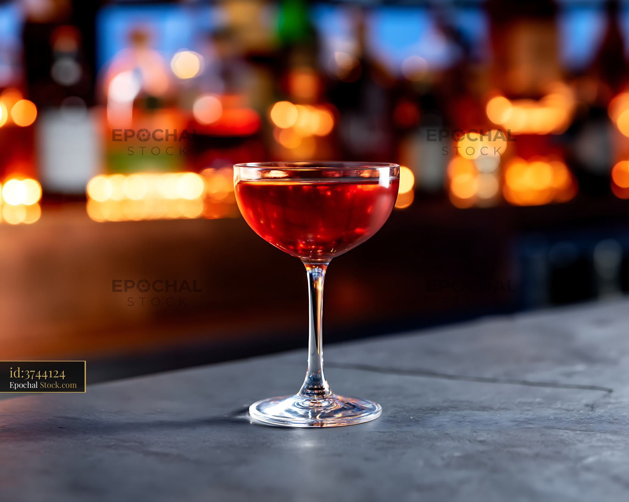 Bushwick Cocktail in Coupe Glass at Dark Bar - stock photo