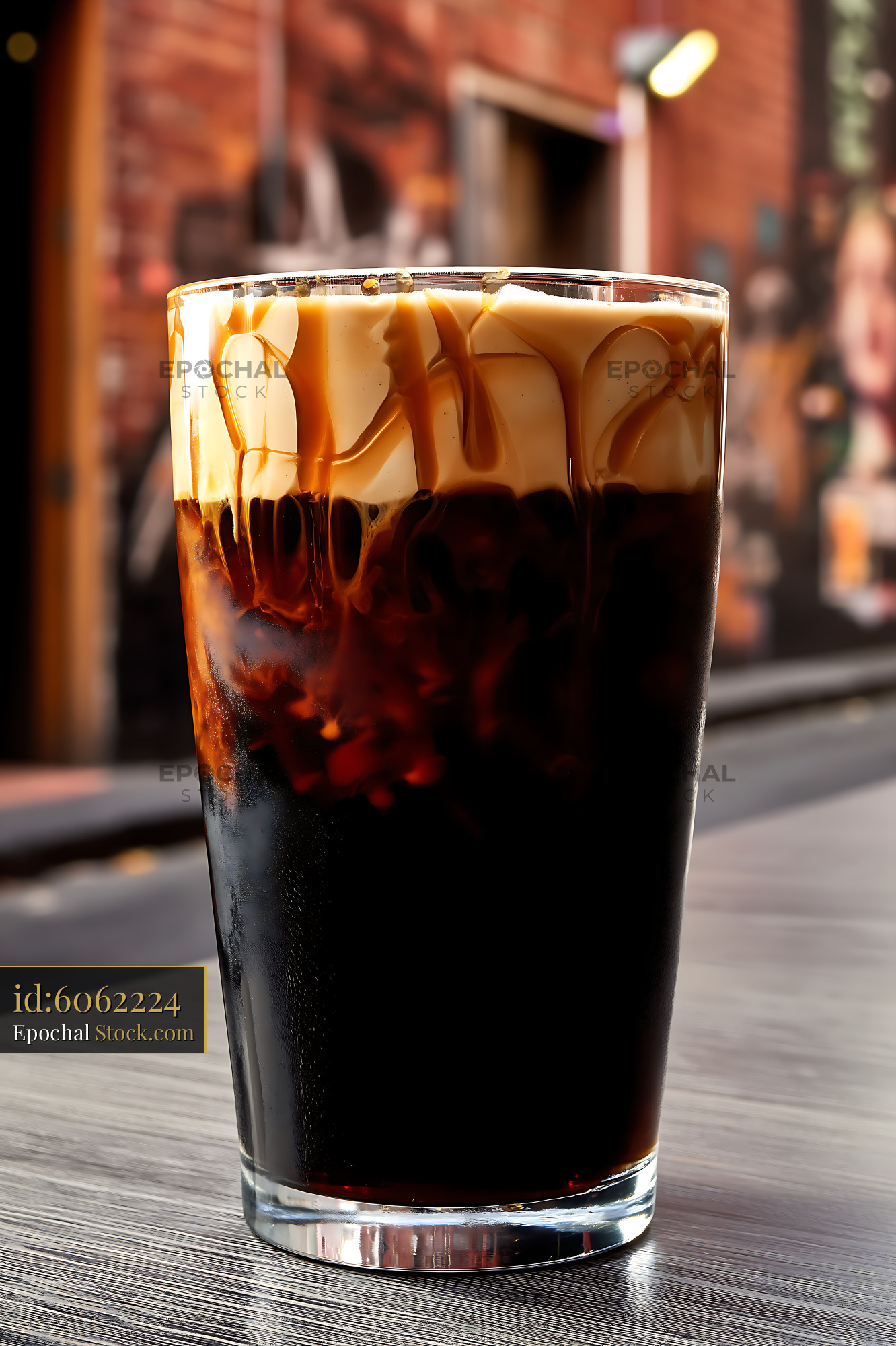 Iced Nitro Caramel Coffee on Urban Street - stock photo