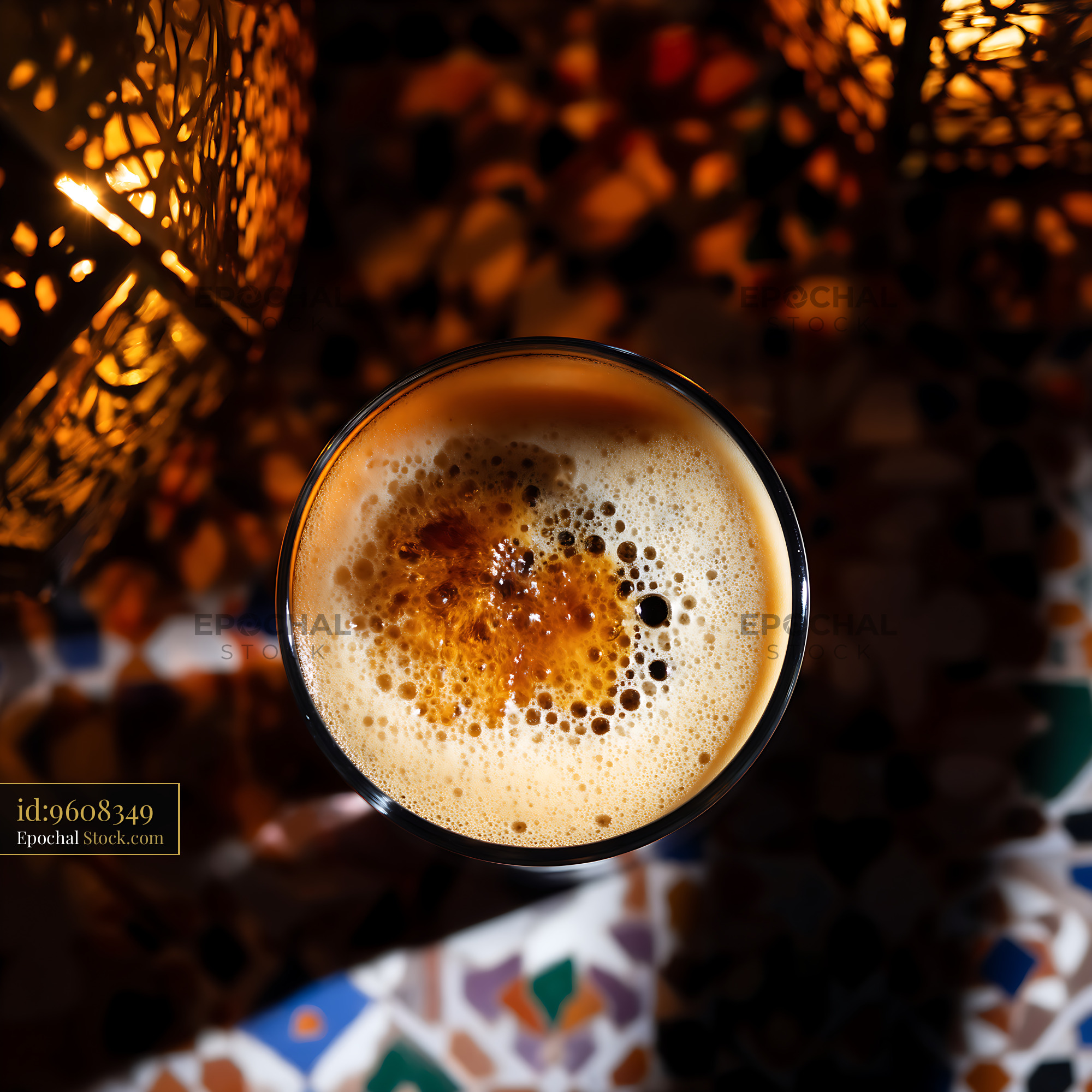 Nitro Caramel Coffee Glass with Creamy Foam - stock photo
