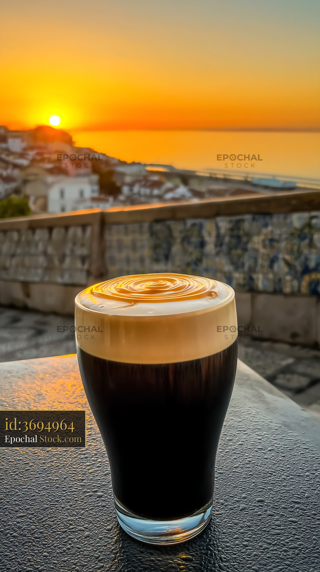 Cappuccino with Mediterranean Sunset View - stock photo