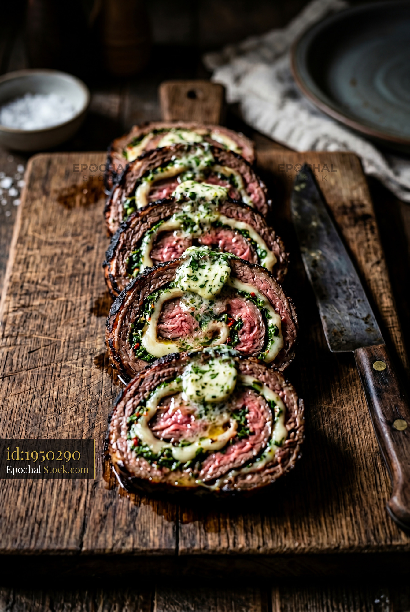 Sliced Beef Roulade with Pesto Herb Filling - stock photo