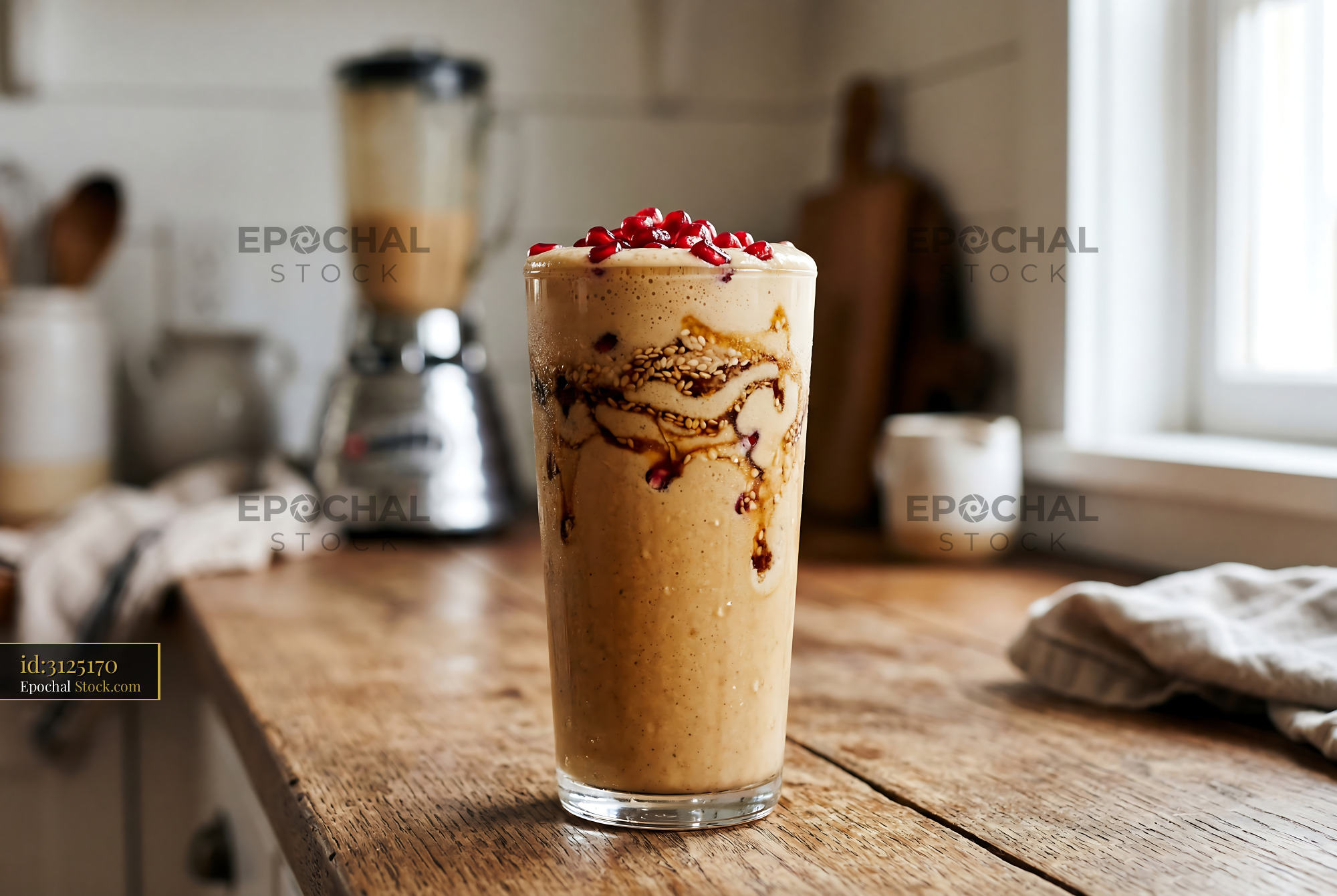 Tahini Date Shake Topped with Pomegranate - stock photo