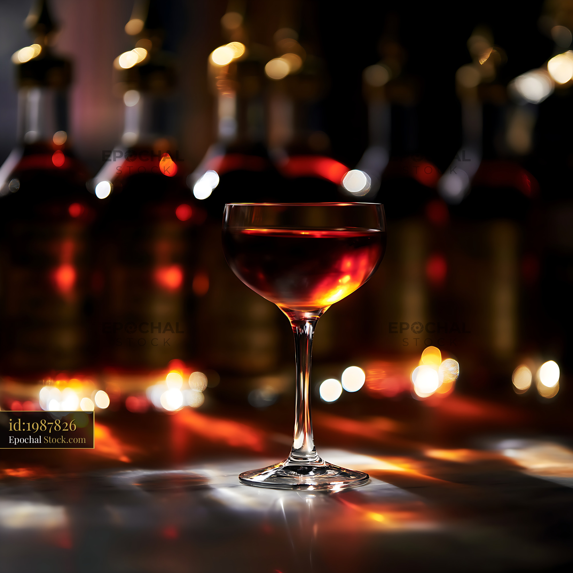 Bushwick Cocktail in Coupe Glass with Bottles - stock photo