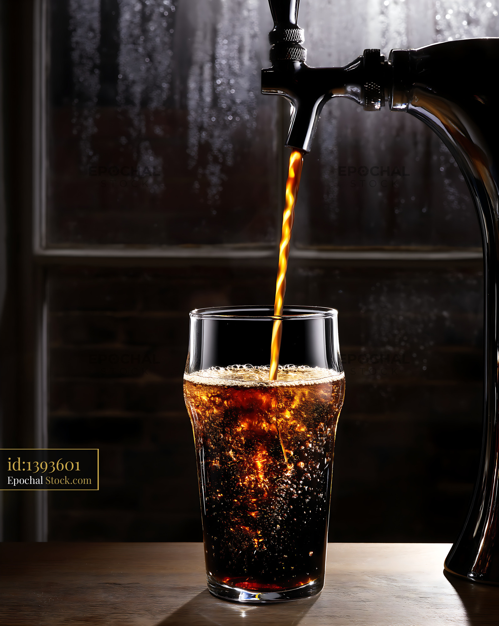 Nitro Caramel Coffee Pouring Into Iced Glass - stock photo