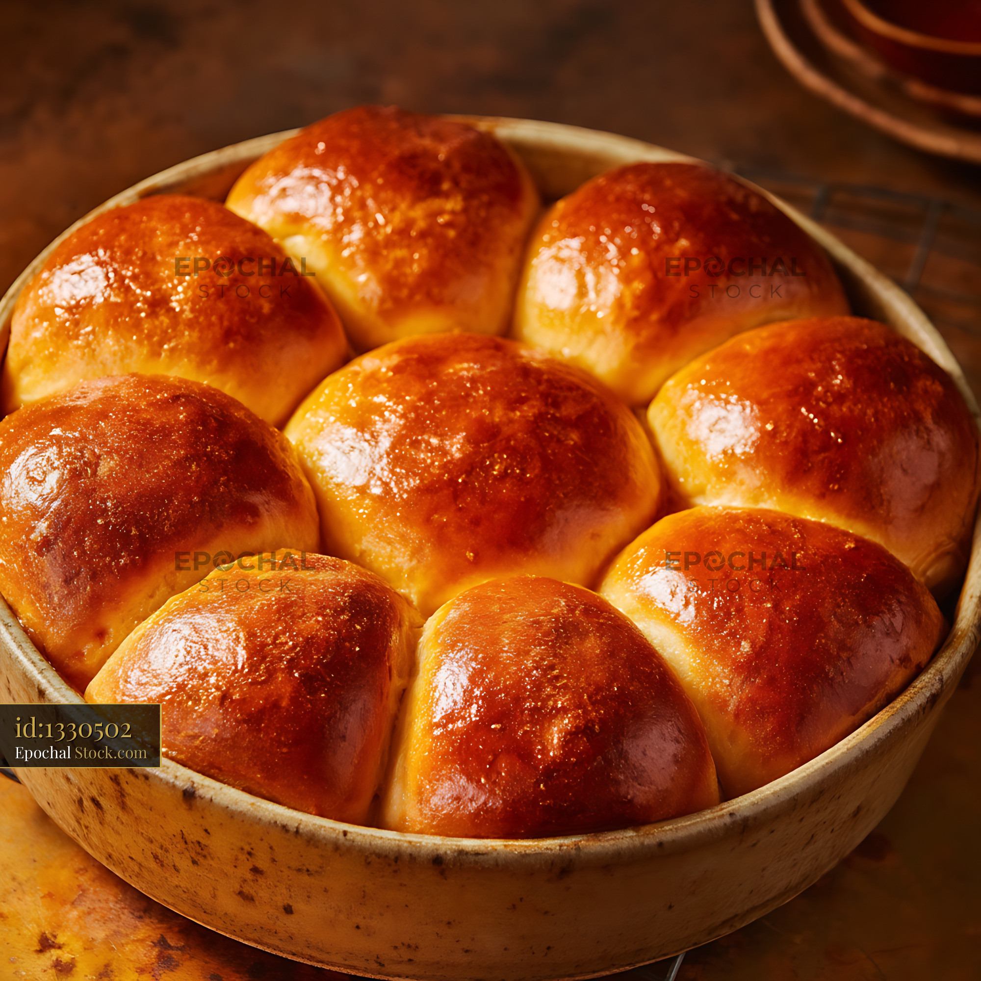 Golden Dinner Rolls in Rustic Serving Bowl - stock photo