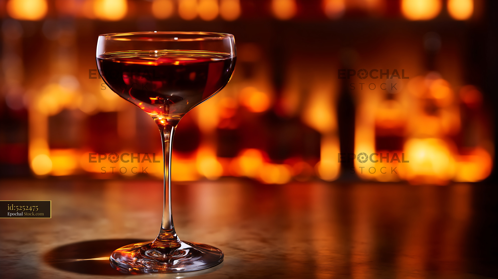 Bushwick Cocktail in Coupe Glass at Bar - stock photo