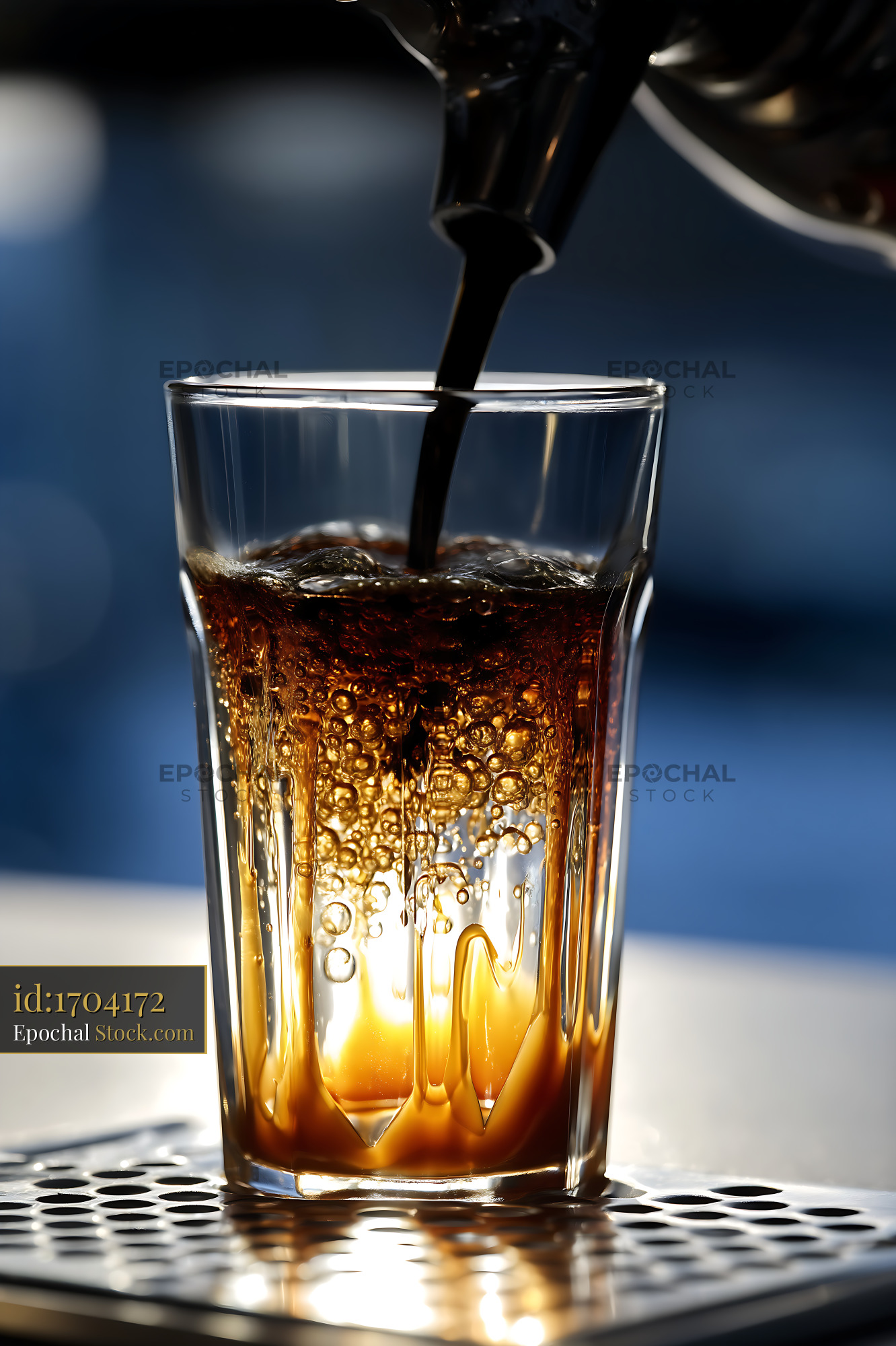 Nitro Caramel Coffee Pouring With Carbonation - stock photo