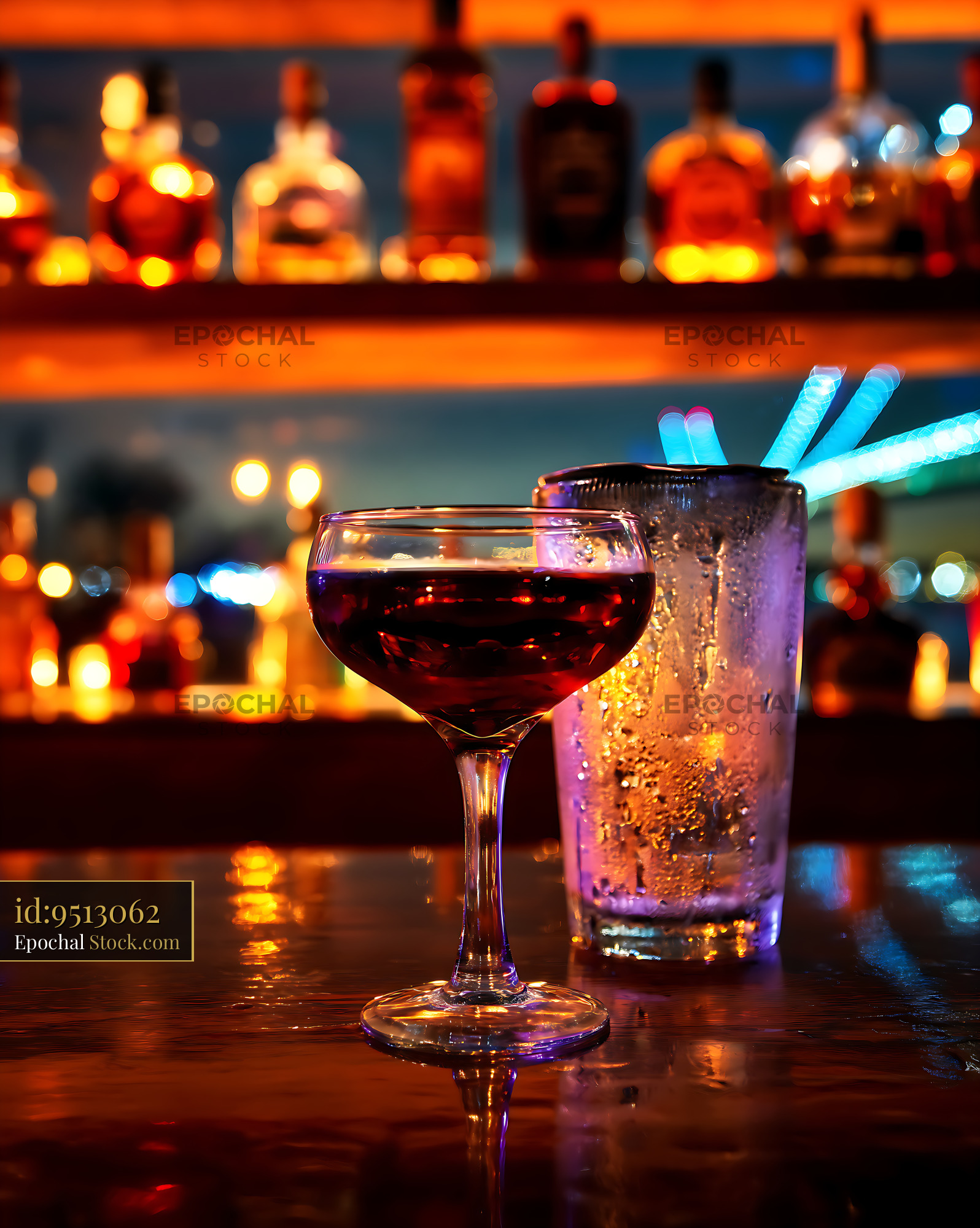 Red Martini Cocktail on Bar Counter - stock photo