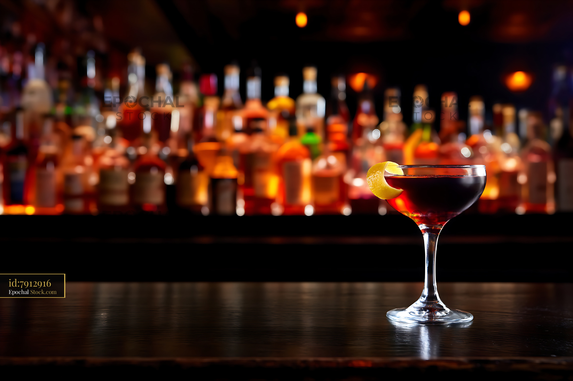 Bushwick Cocktail on Dark Bar Counter with Garnish - stock photo