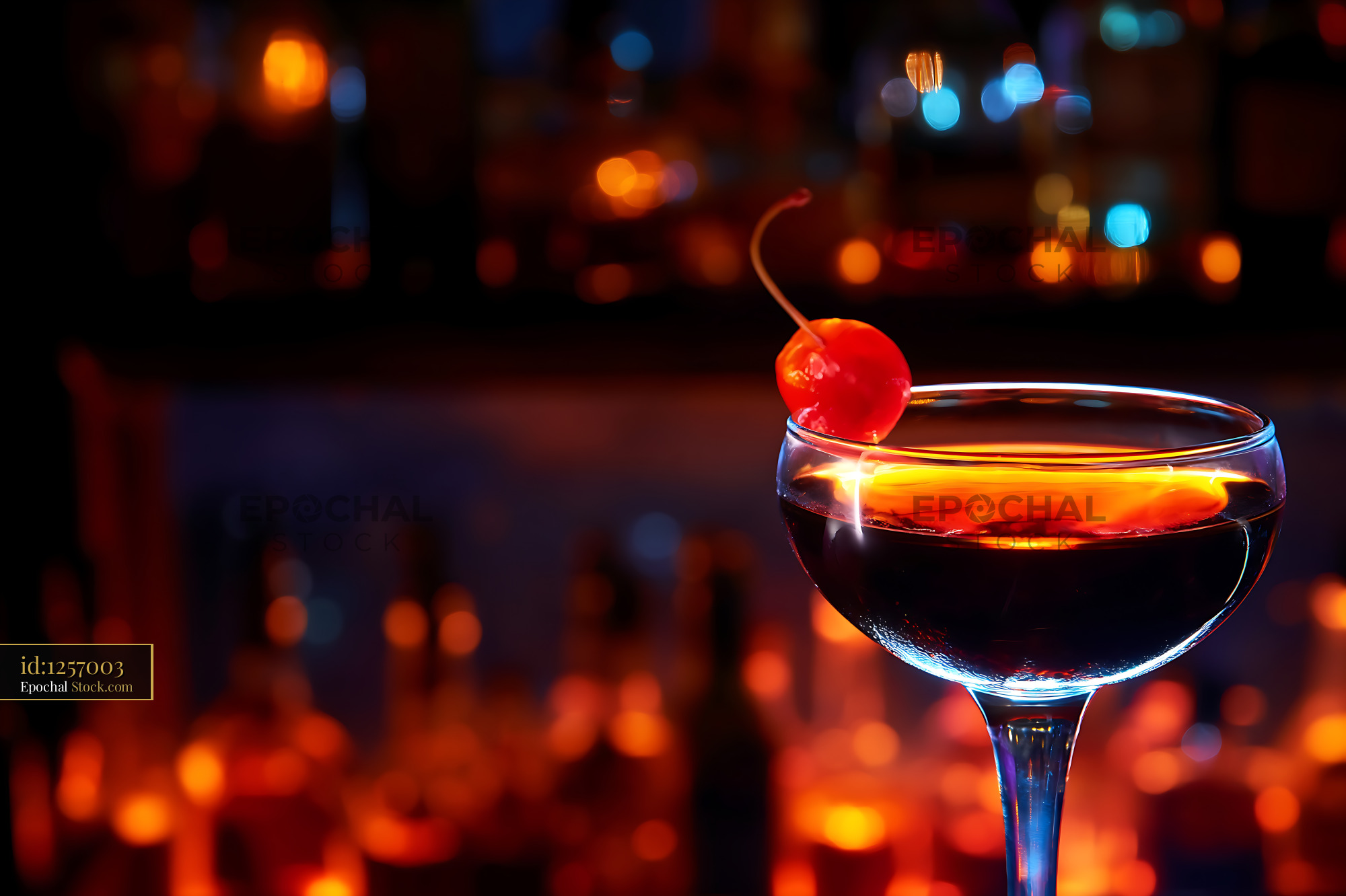 Bushwick Cocktail with Cherry Garnish at Bar - stock photo