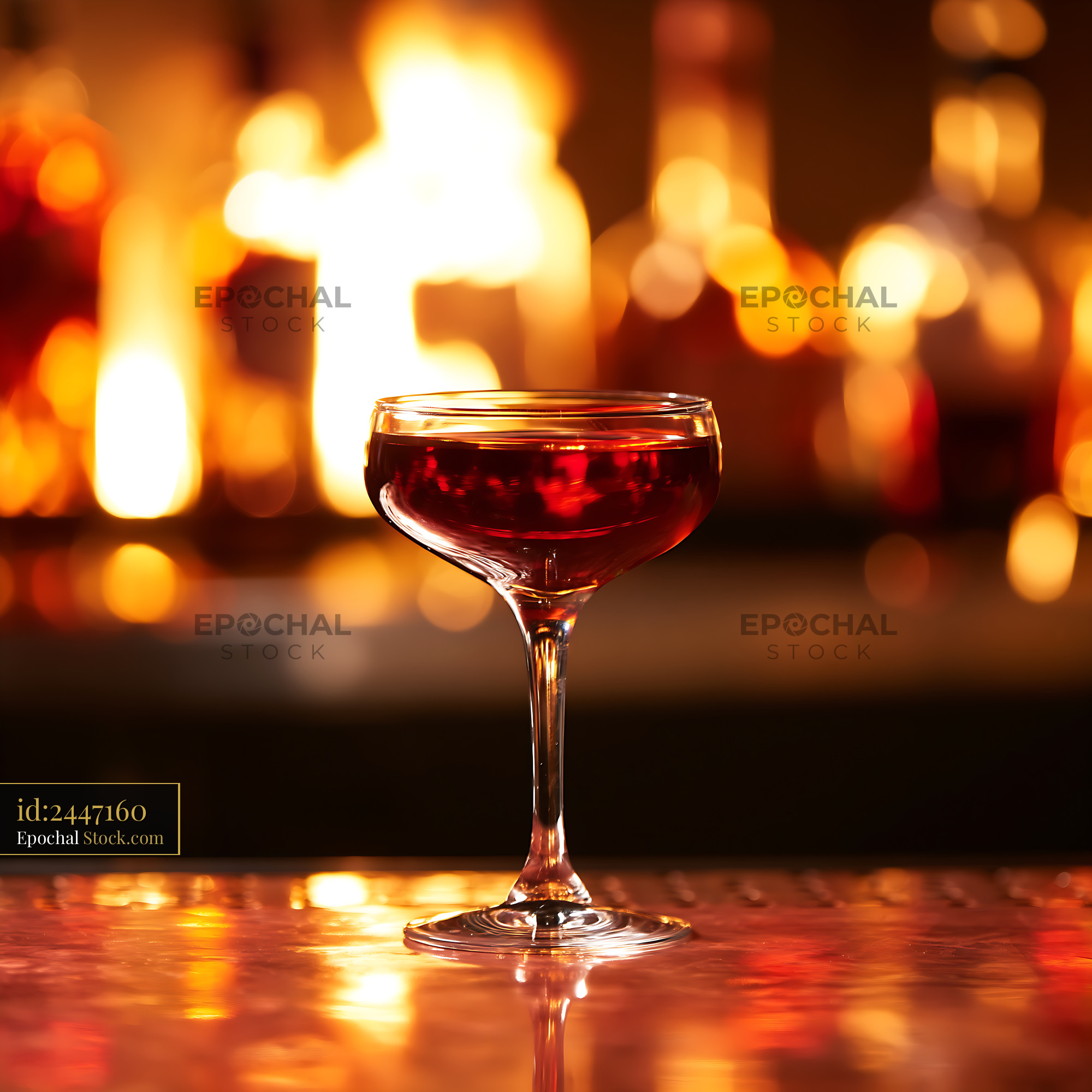 Bushwick Cocktail in Coupe Glass at Bar - stock photo