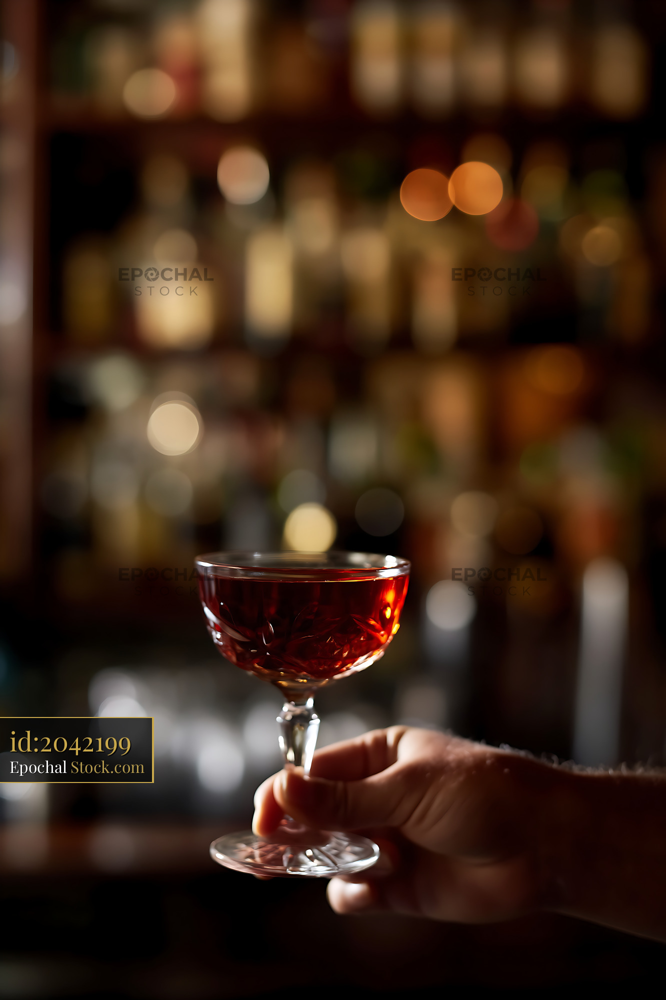 Bushwick Cocktail in Coupe Glass at Bar - stock photo