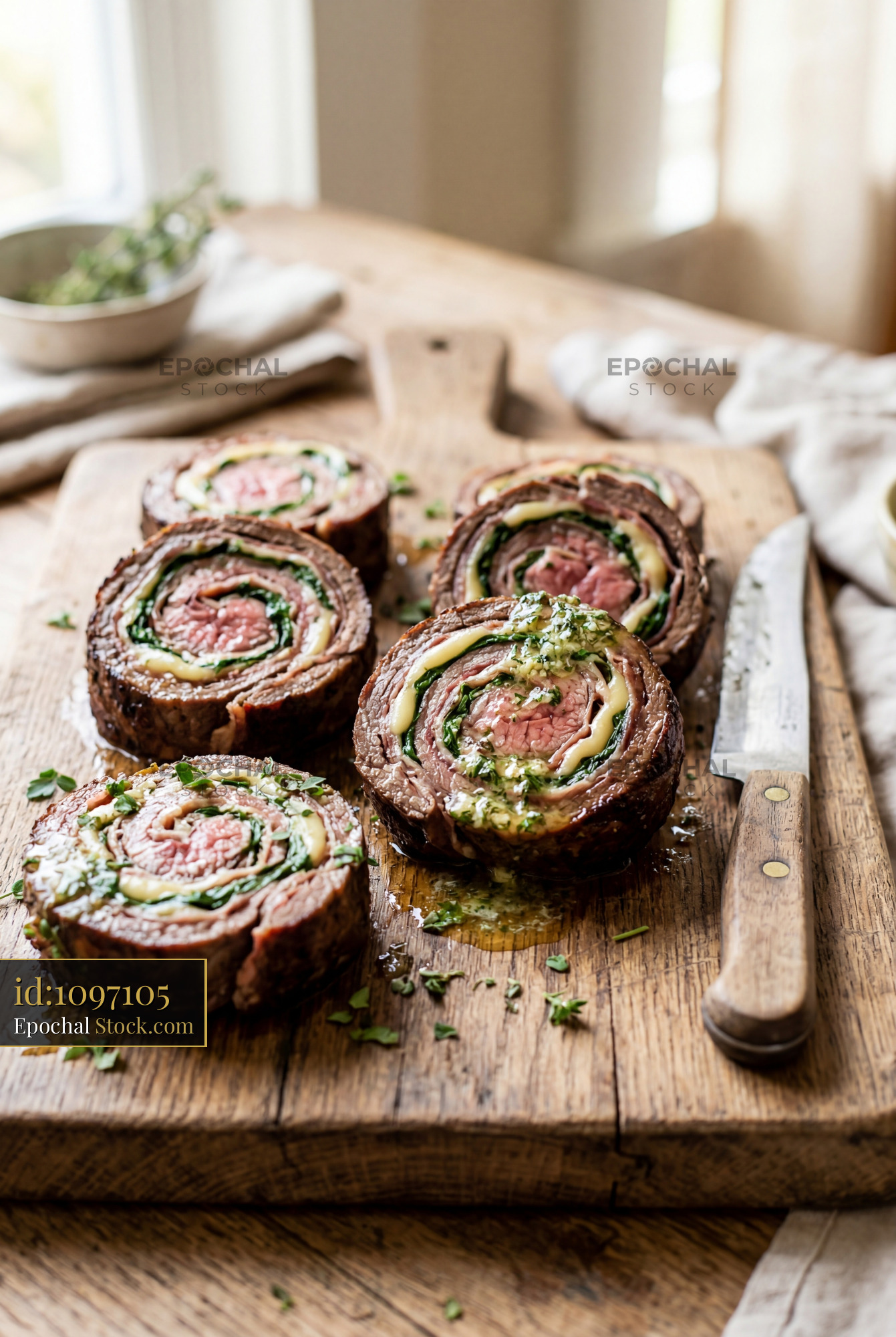 Beef Roulade Slices with Herb Garnish - stock photo