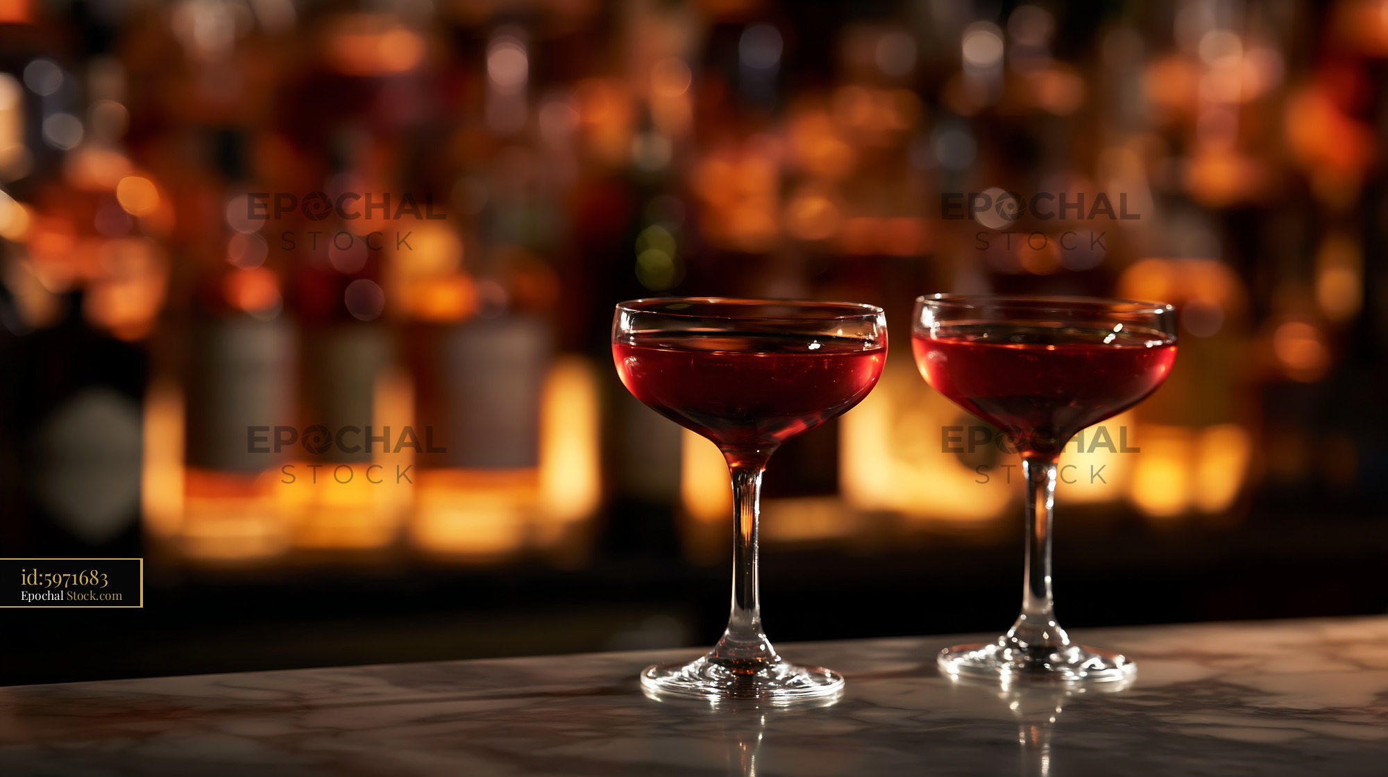Red Cocktails on Bar with Warm Bokeh Lights - stock photo