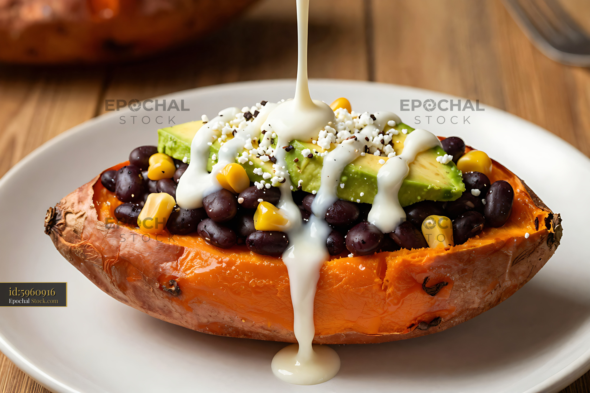 Sweet Potato with Black Beans & Sauce Drizzle - stock photo