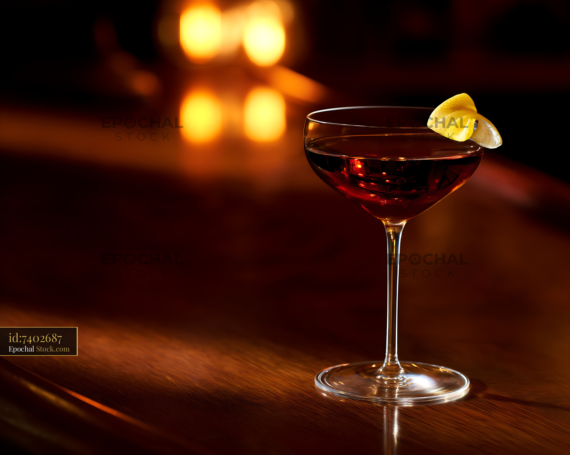 Saratoga Cocktail with Lemon Twist at Bar - stock photo