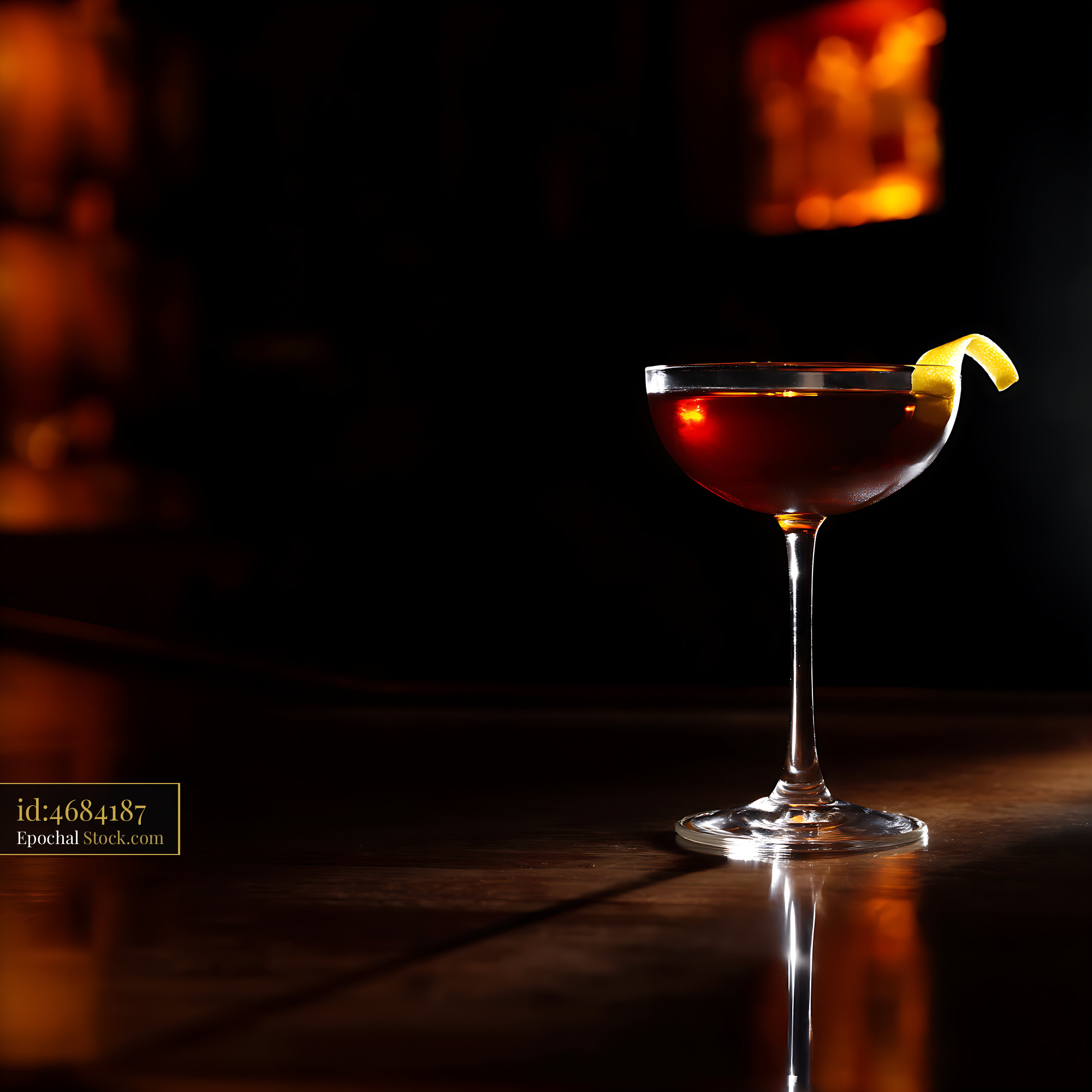 Saratoga Cocktail with Lemon Twist at Bar - stock photo