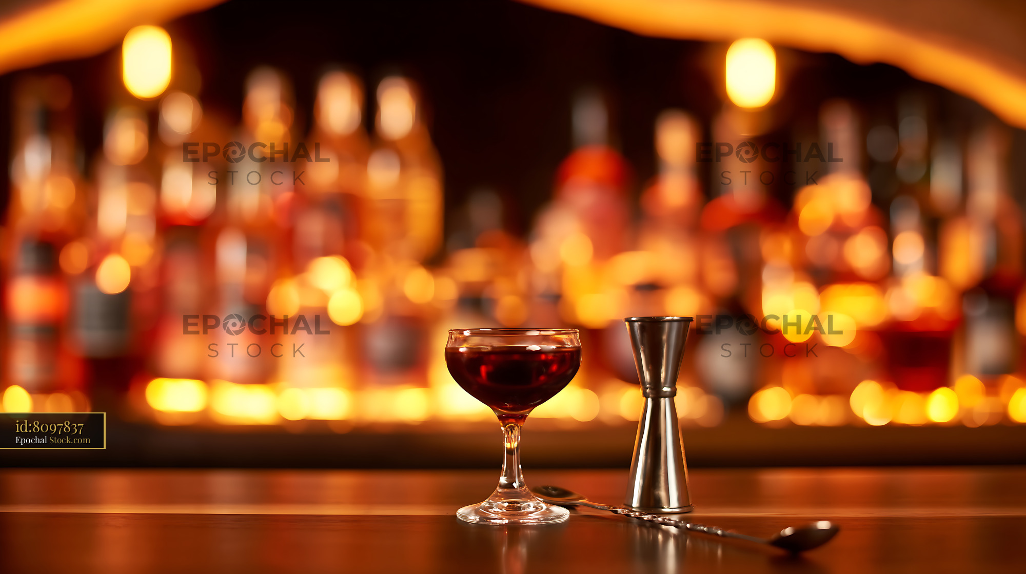 Bushwick Cocktail in Coupe Glass at Bar - stock photo