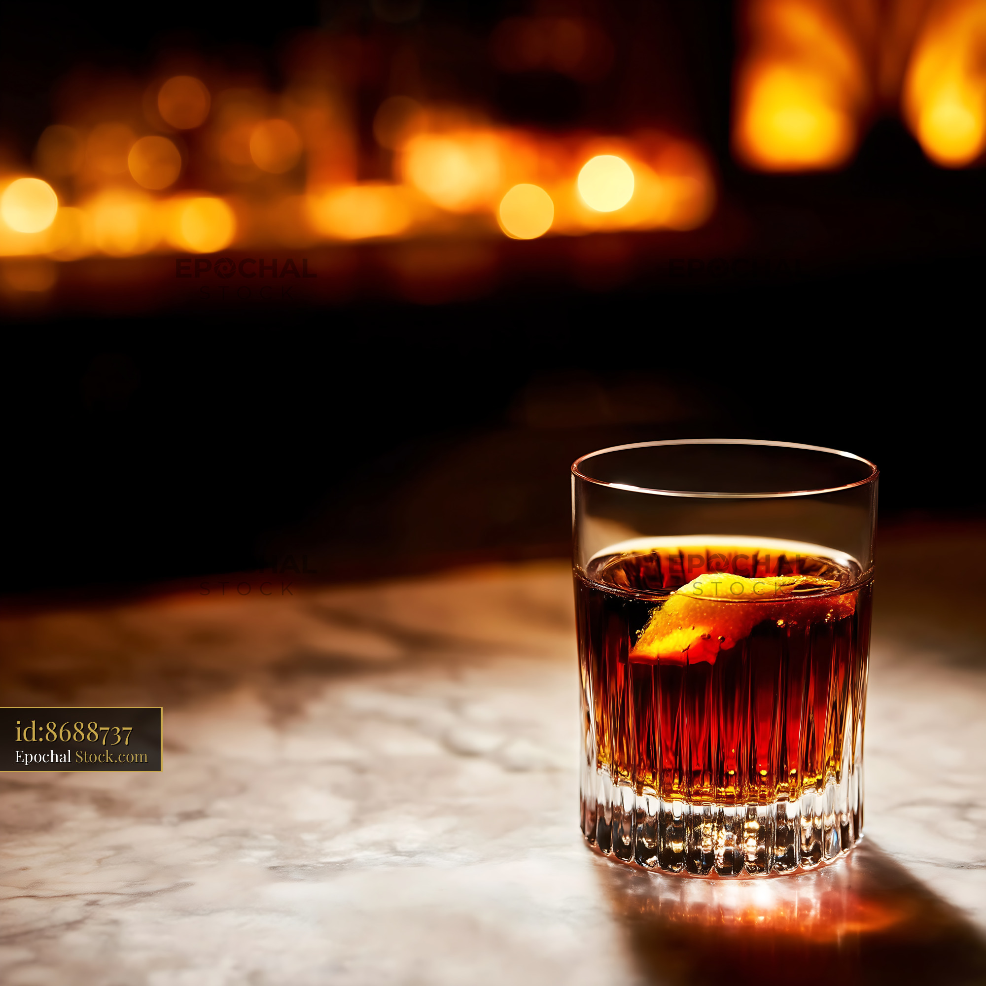 Whiskey Glass with Citrus Garnish, Candlelit Mood - stock photo