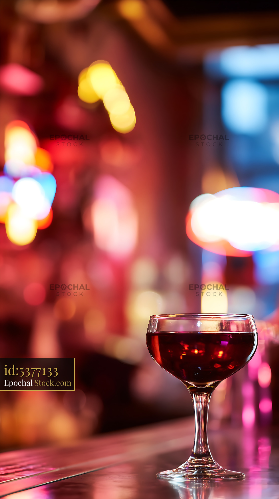 Bushwick Cocktail Glass with Neon Bokeh Lights - stock photo