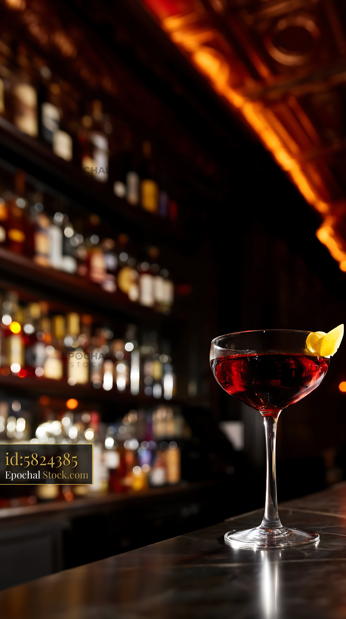 Red Bushwick Cocktail with Lemon Twist - stock photo