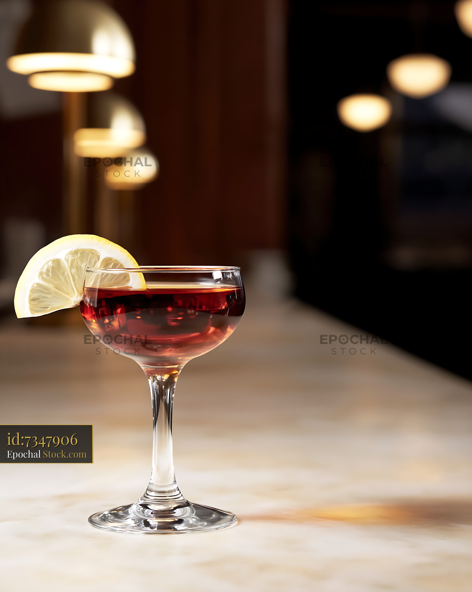 Saratoga Cocktail with Lemon Garnish in Bar - stock photo