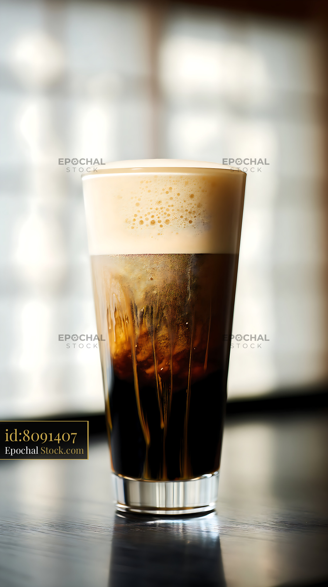 Iced Coffee with Creamy Foam Layer - stock photo