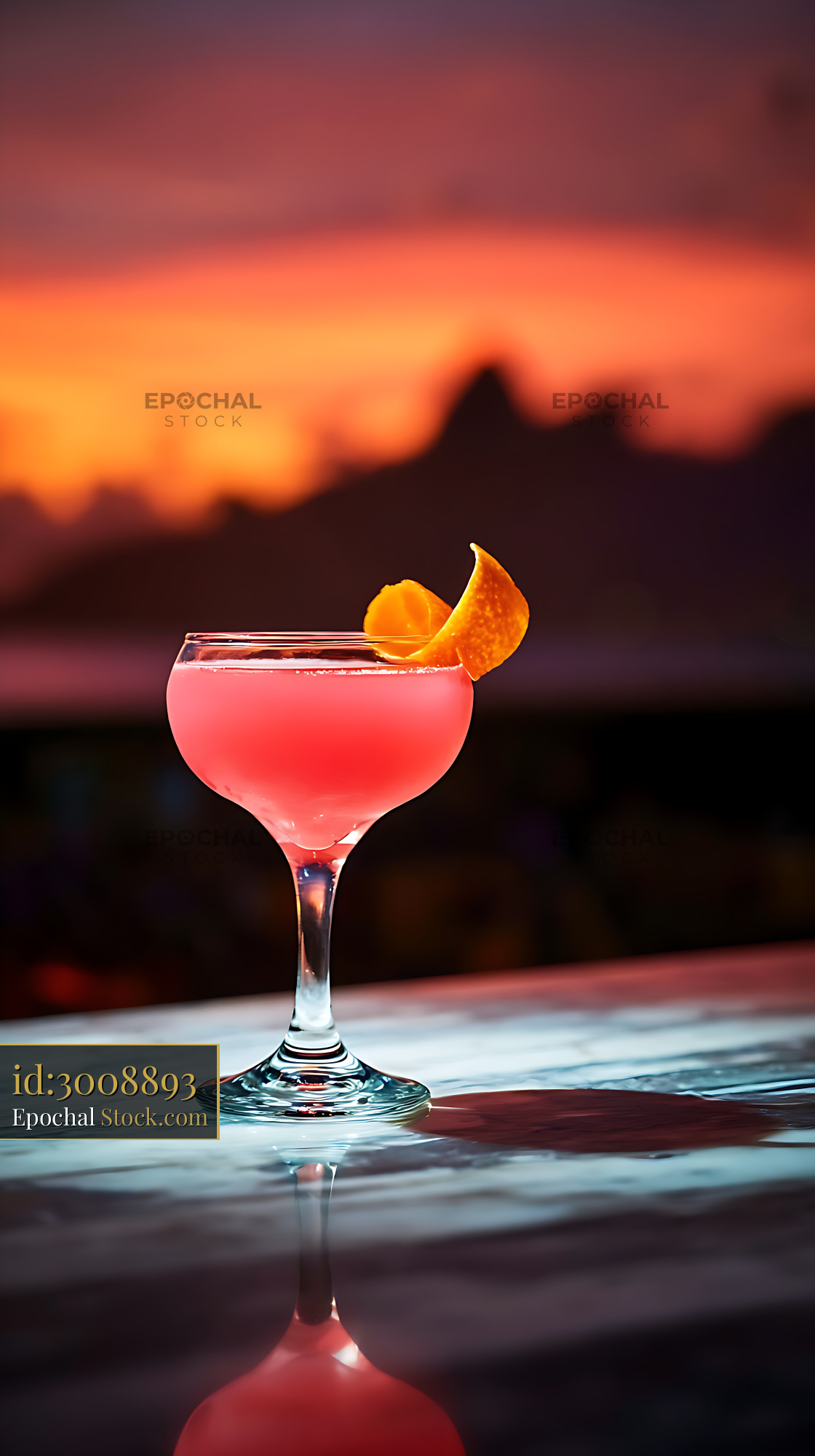 Tropical Cocktail at Sunset with Orange Peel Garnish - stock photo