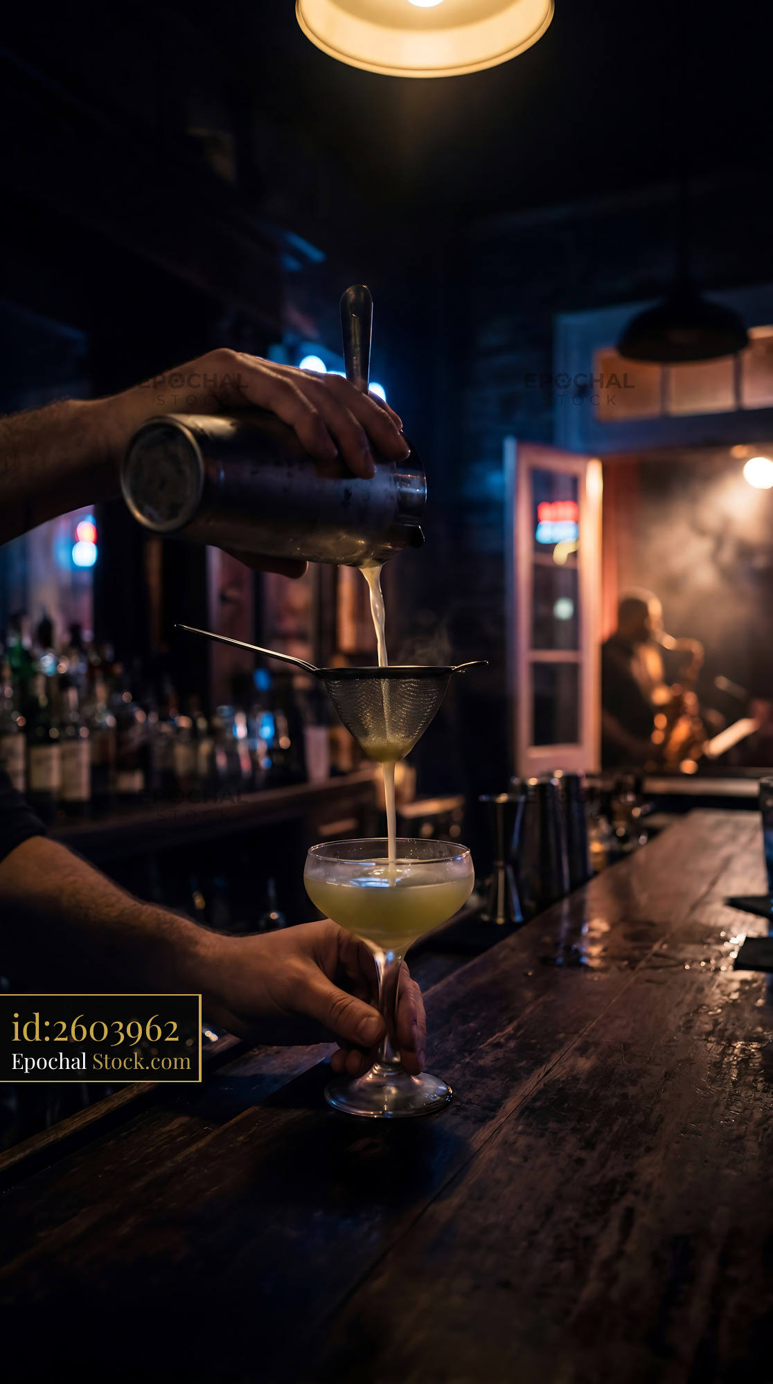 Final Ward Cocktail Being Strained at Bar - stock photo